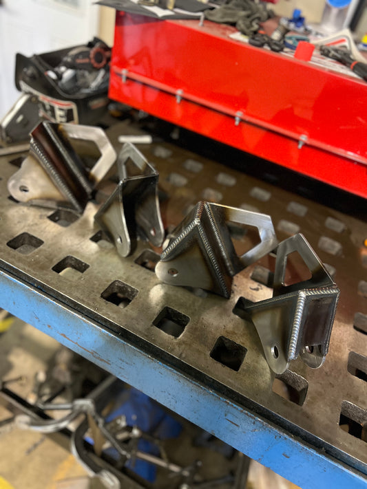 Universal weld on radius arm mounts